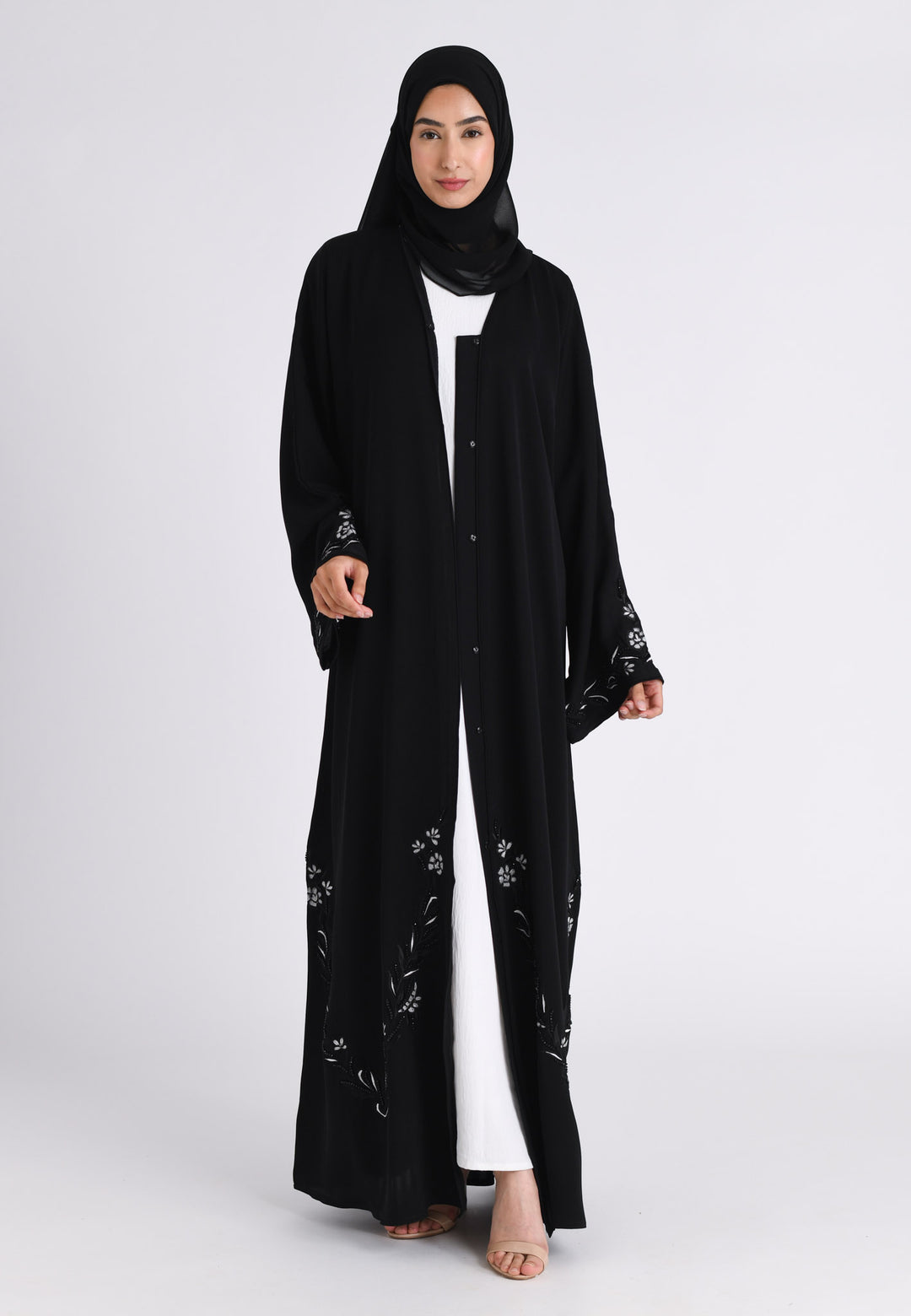 Elegant Noir Embroidered Abaya With Minimal Embellishments